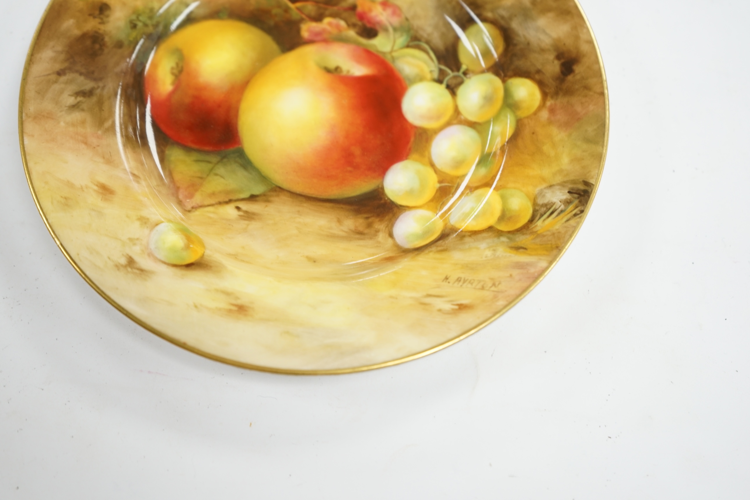 A Worcester cabinet plate, signed Ayrton, decorated with fruit, 15.5cm diameter. Condition - good